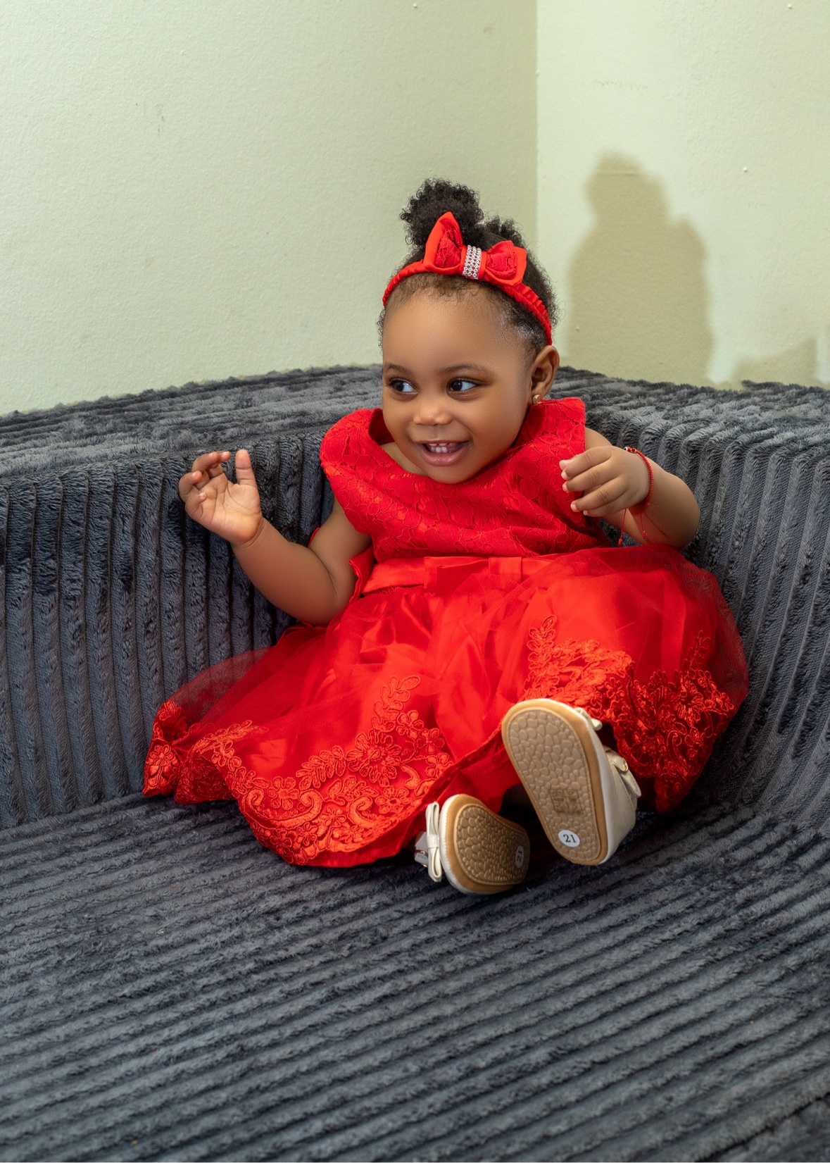 Toddler girl in a red dress