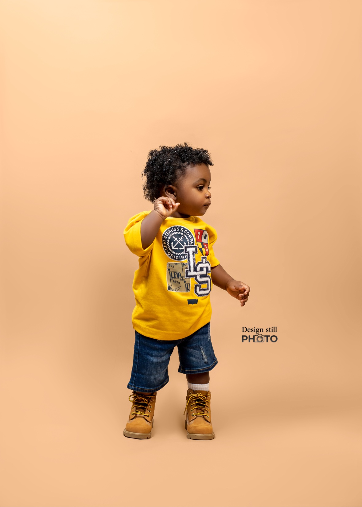 Toddler boy in a yellow shirt