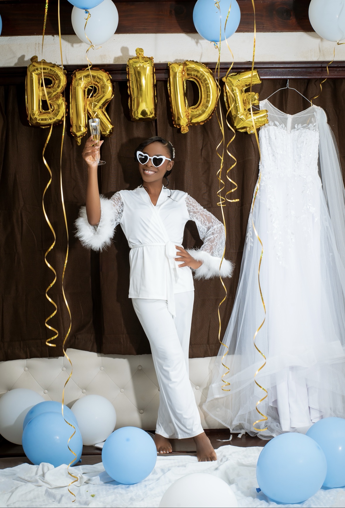 Bride getting ready with BRIDE balloons